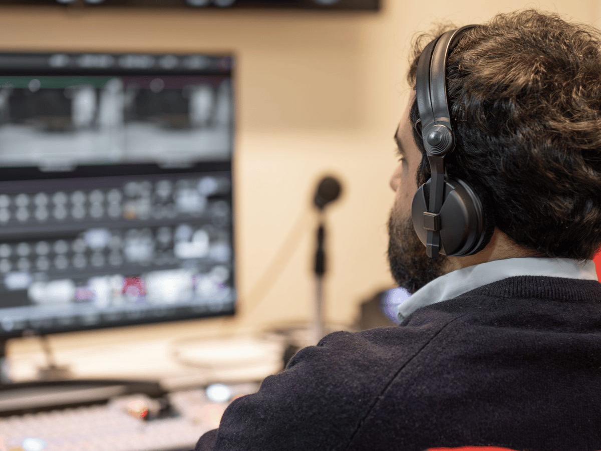 A director at work in a broadcast control room